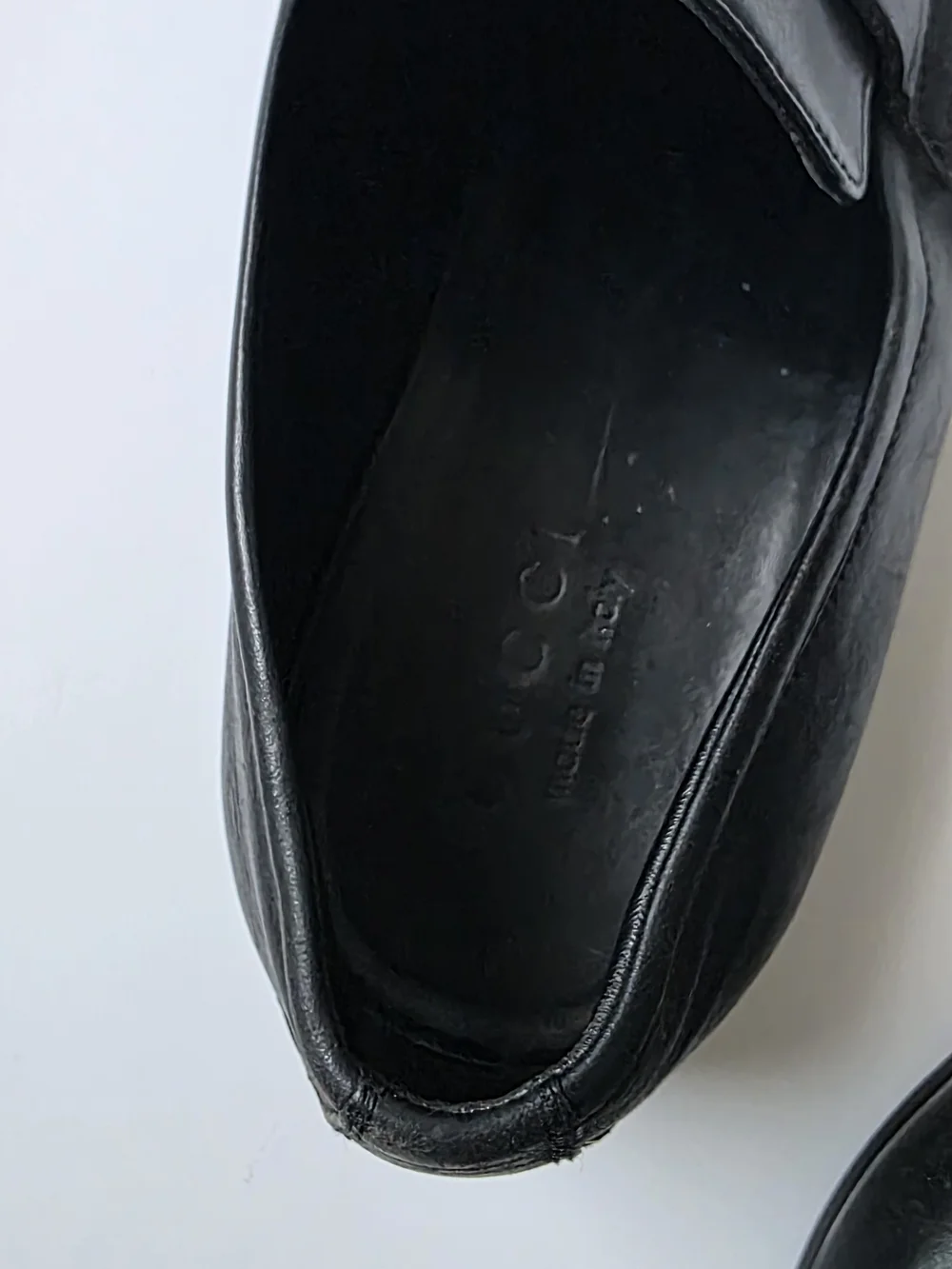 Gucci Black Leather Men’s Slip-On Dress Shoes with Silver Accent